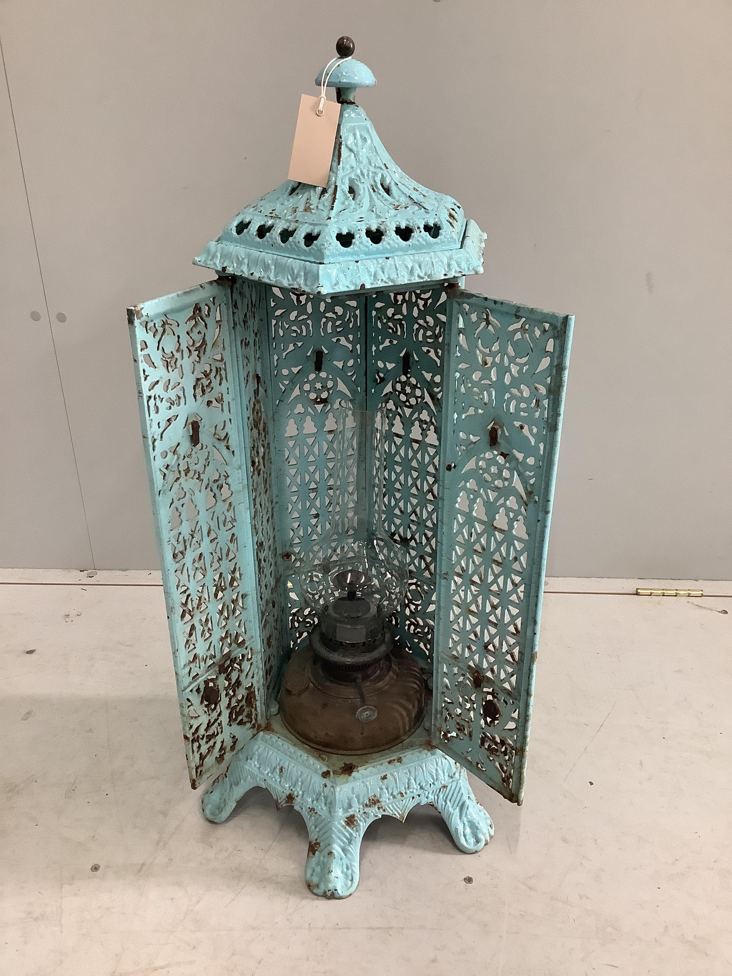 A late 19th century French hexagonal enamelled metal conservatory heater, height 85cm